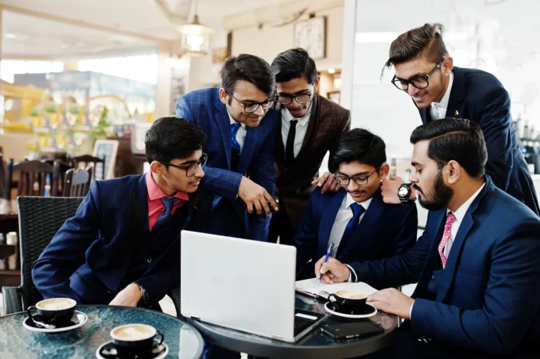 collaborative-process-indian-business-mans-during-brainstorming-meeting-officediverse-team-young-people-dressed-suits-cooperating-developing-common-project (1)